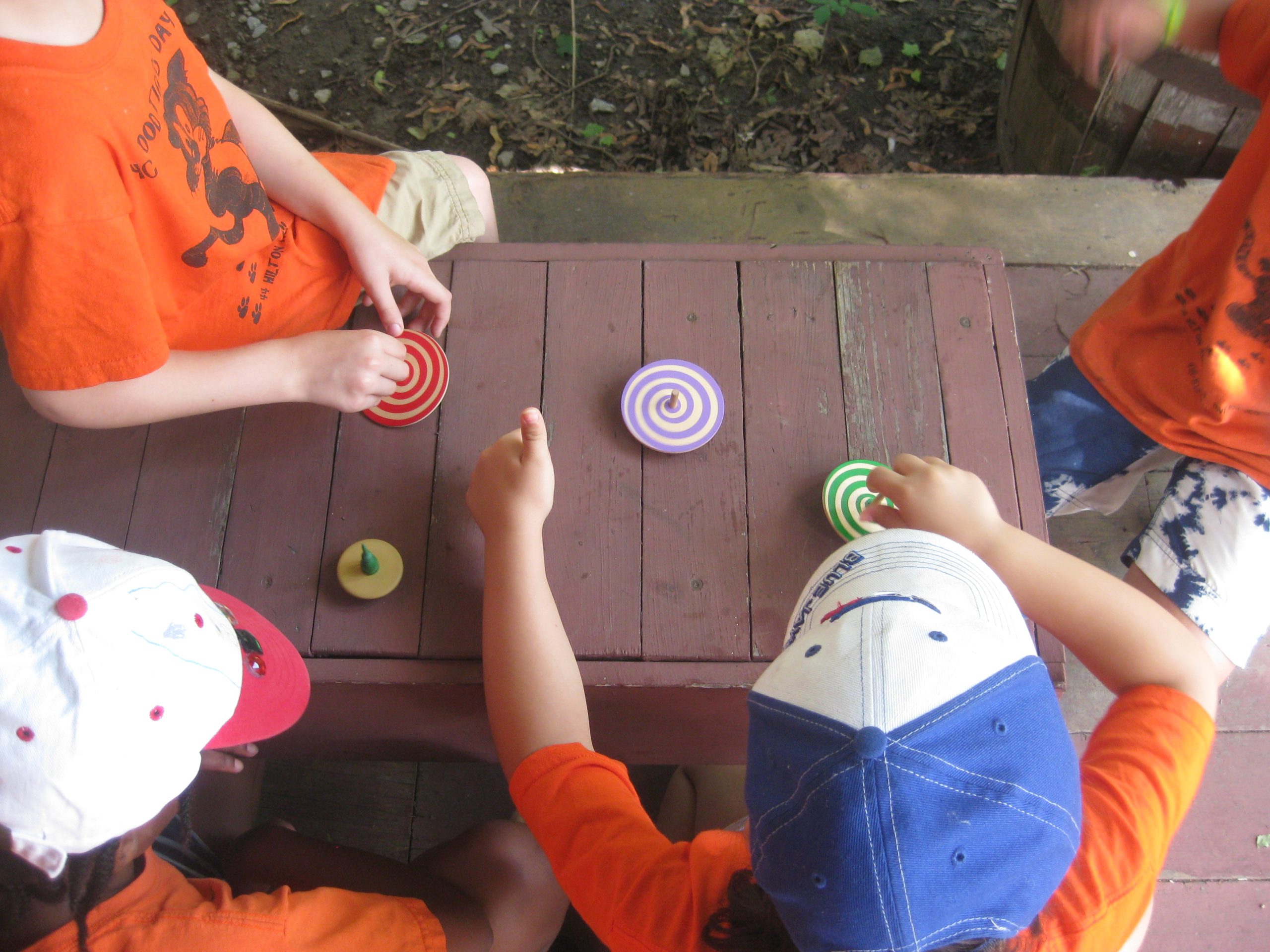 Children spinning tops